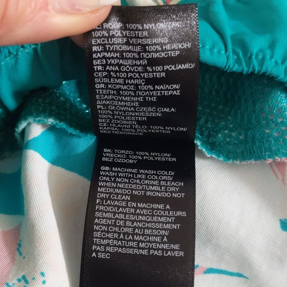The North Face lightweight swim/athletic shorts, elastic waistband, size M